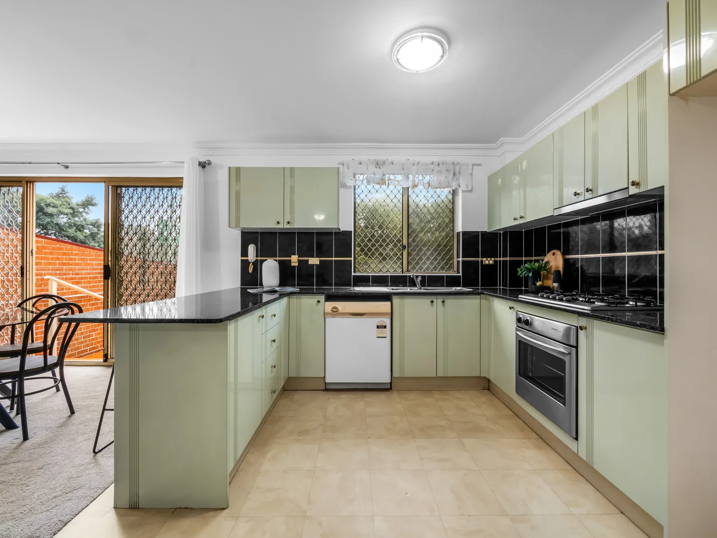 SPACIOUS, NORTH FACING, COURTYARD APARTMENT - View 3