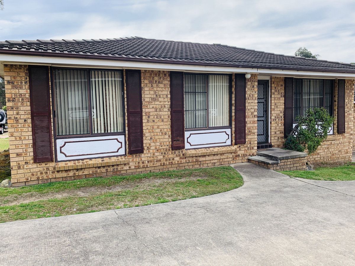 1/4 Bundy Place, Macquarie Fields NSW 2564 Villa For Rent Domain