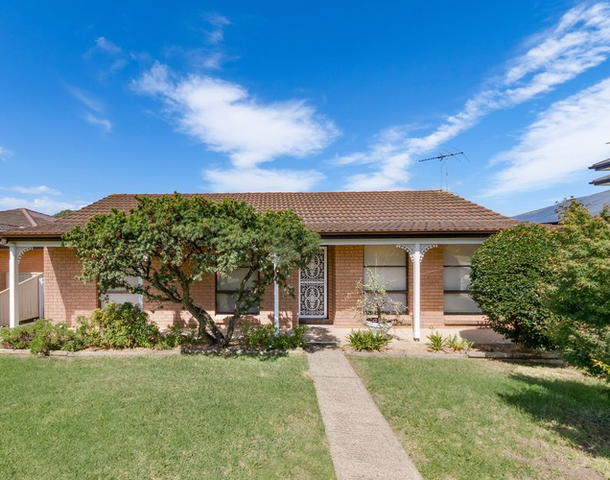 12 Fuchsia Crescent, Macquarie Fields NSW 2564