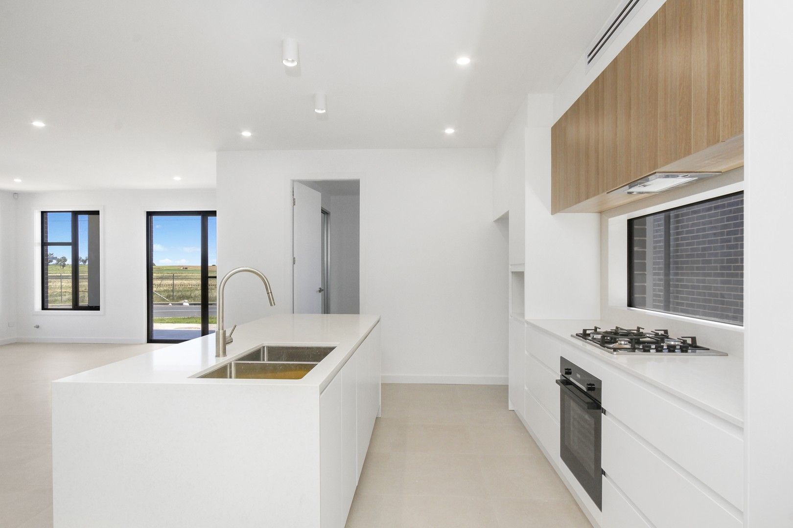 5 bedrooms House in 102 Grassbird Avenue ORAN PARK NSW, 2570