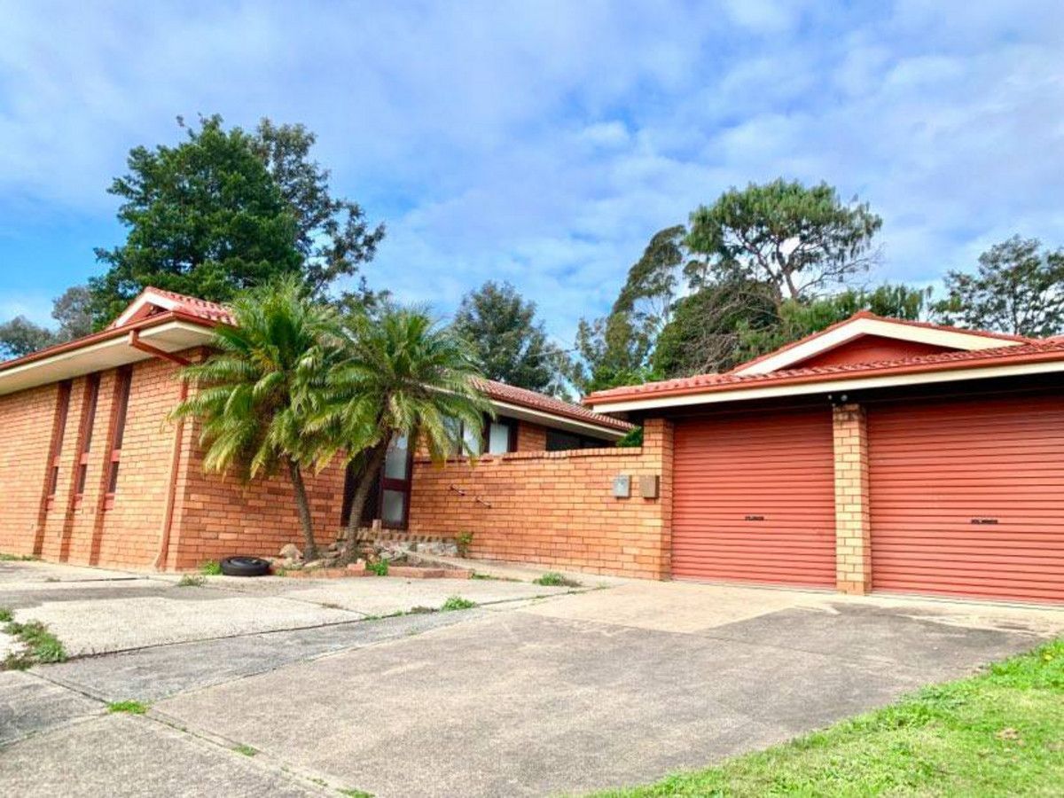 64 Woodhouse Drive, Ambarvale NSW 2560