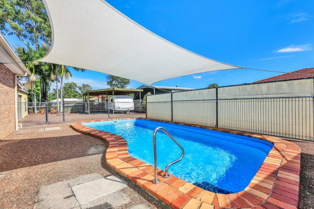Coastal Living Made Easy Renovated Home with Pool & Shed - View 4