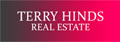 Terry Hinds Real Estate's logo