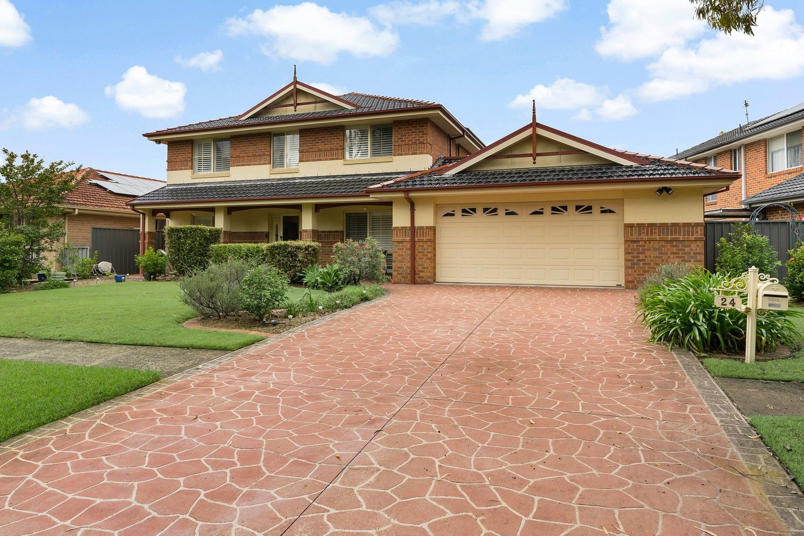 4 bedrooms House in 24 Cherry Blossom Crescent HAMLYN TERRACE NSW, 2259