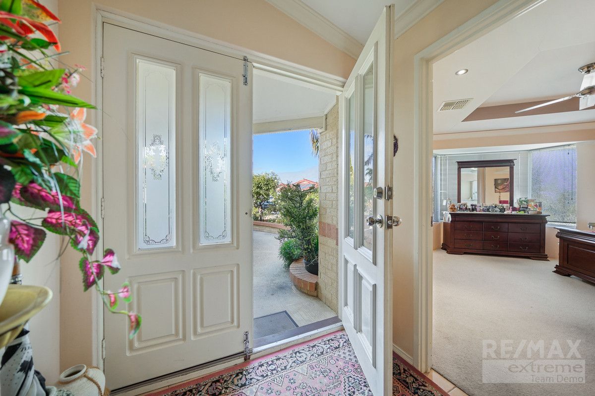4 bedrooms House in 21 Mallina Circuit CARRAMAR WA, 6031