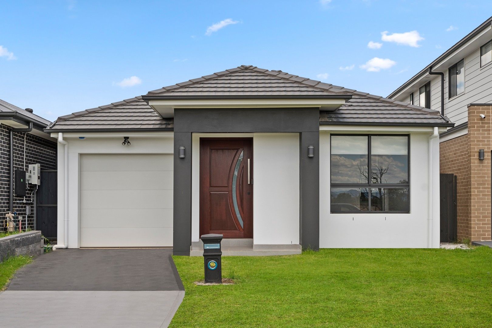 4 bedrooms House in 63 Ribbonwood Crescent MARSDEN PARK NSW, 2765