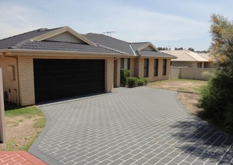 House in 245 Denton Park Drive, ABERGLASSLYN NSW, 2320