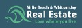 Airlie Beach and Whitsunday Real Estate's logo