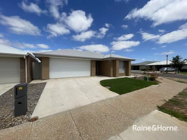 Cozy 4 Bedroom Home with 2 Living Areas