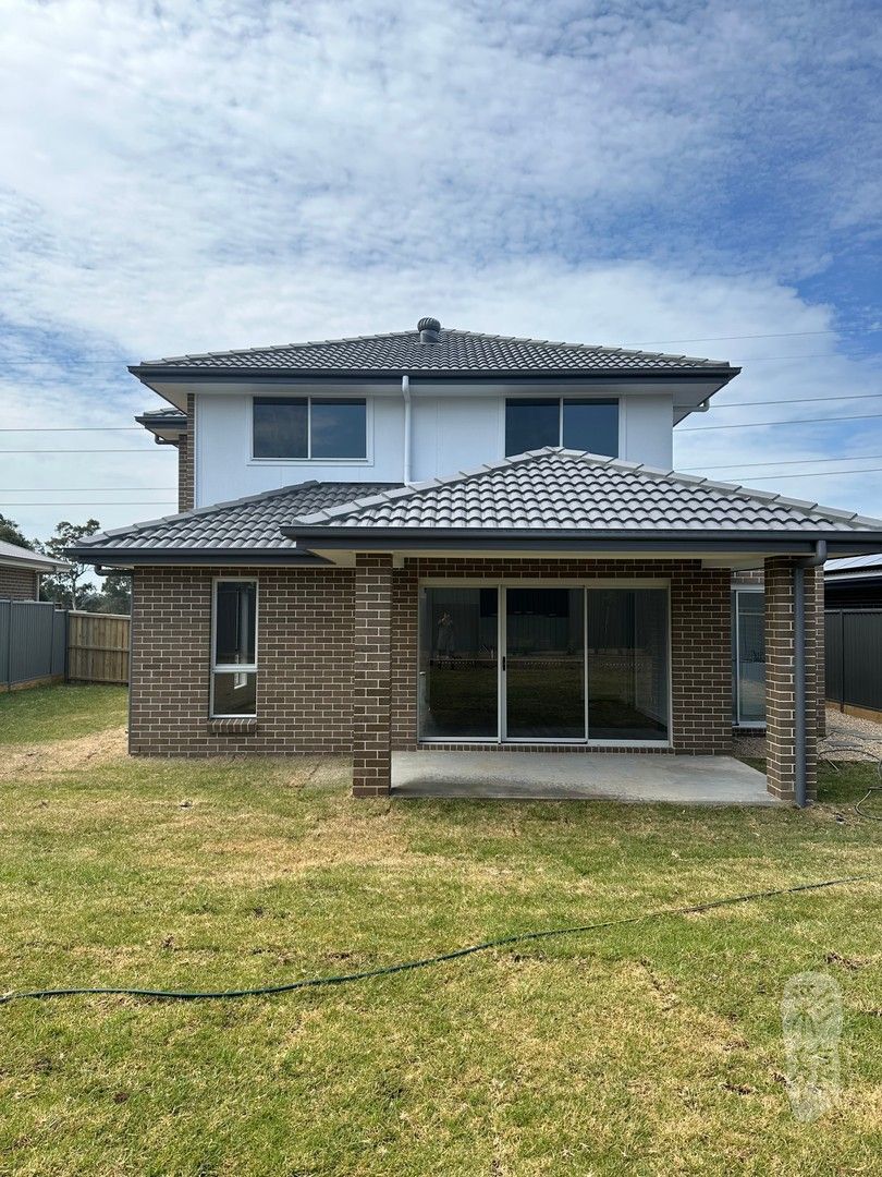 4 bedrooms House in 11 Galaxy Street ORAN PARK NSW, 2570