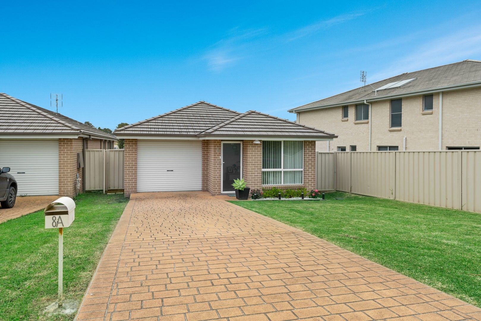 3 bedrooms House in 8a Blue Bell Way WORRIGEE NSW, 2540