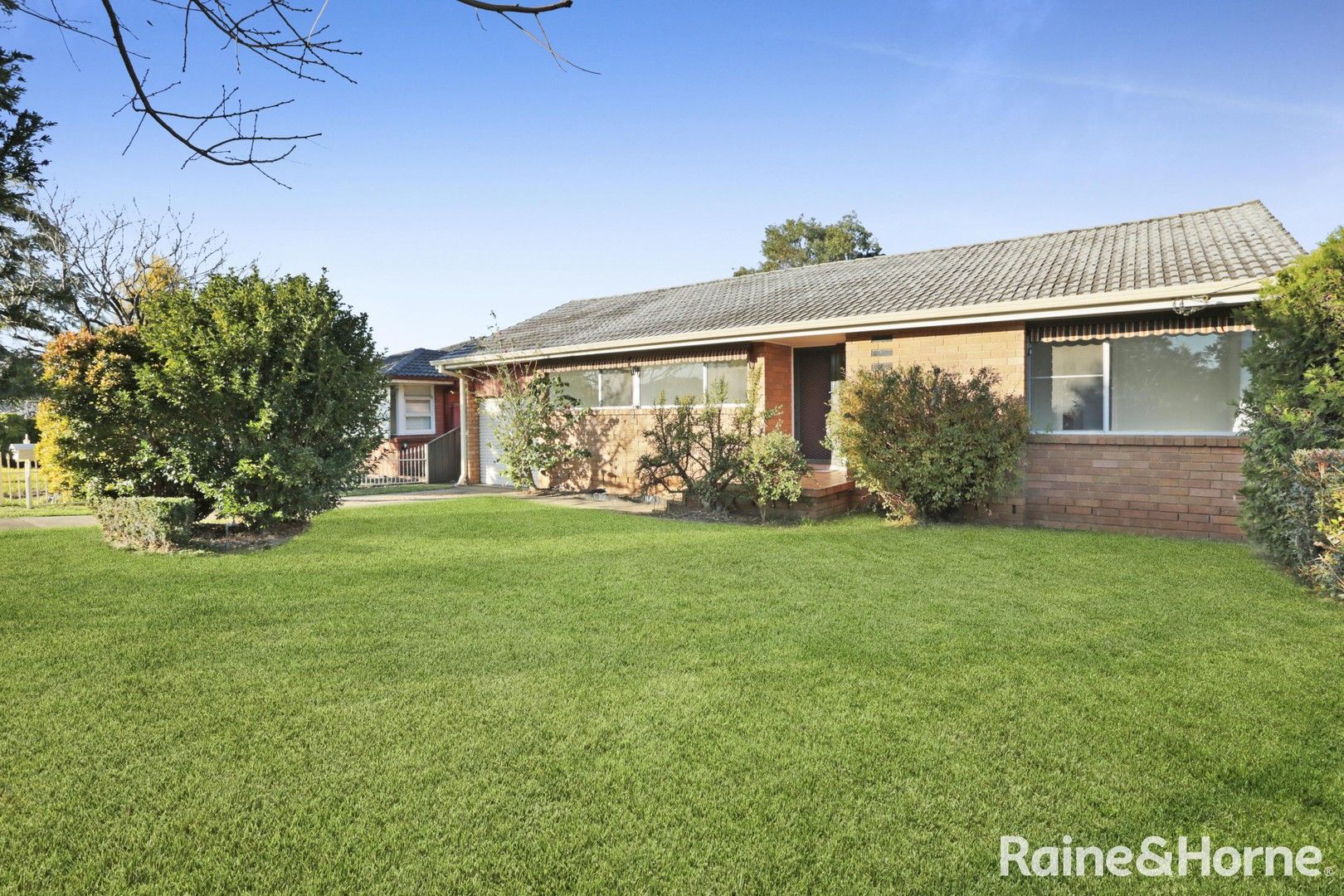 12 Harvey Street, Macquarie Fields NSW 2564, Image 0